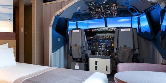 På dette hotellet får du med flysimulator på rommet